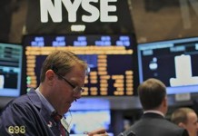 Wall Street Rises A Day After Nasdaq Outage, Microsoft Up