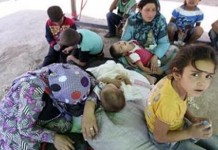 Syrian Kurds Trek To Iraq Over Parched Hills