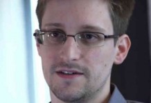 Britain Defends Top Official’s Role In Halting Snowden Reports