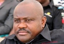 AS WIKE FACES THE JURY