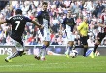 Suarez Lifts Liverpool Into Second