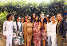 Kim Kardashian Puts Bump On Display In A Nude Skin Tight Dress