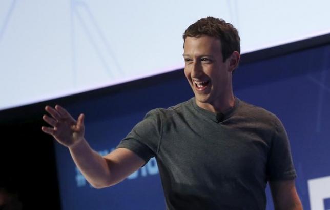 Mark Zuckerberg, founder of Facebook, arrives for a keynote speech during the Mobile World Congress in Barcelona