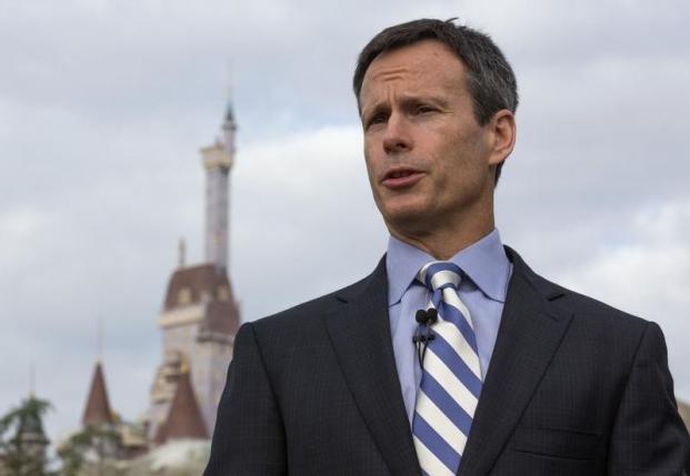 File photo of Tom Staggs, Chief Operating Officer of Walt Disney Co, speaking during a ribbon-cutting ceremony for the New Fantasyland in Lake Buena Vista, Florida