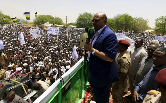 Sudanese President Omar Hassan al-Bashir addresses the crowd during a campaign rally in East Darfur
