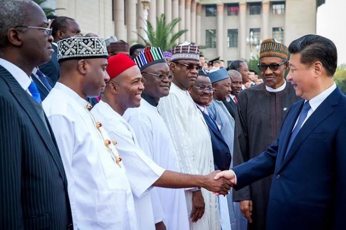 ecbd5e05-3d85-4244-8747-0c29522ffada President Xi Jinpeng in company of President Buhari exchange compliments with Nigerian delegation which includes L-R: Minister of Power, Works & Housing Babatunde Fashola, Minister of Transport Rotimi Amaechi, Minister of Science and Tecnology Ogbonnaya Onu, Governor of Benue State Dr. Samuel Ortom, Governor of Yobe State Alhaji Ibrahim Geidam, Governor of Oyo State Abiola Ajimobi, Governor of Jigawa Badaru Abubakar and Governor of Ogun State Ibikunle Amosun, during the Programme of the Official Welcoming Ceremony at the Great Hall, in Beijing China.