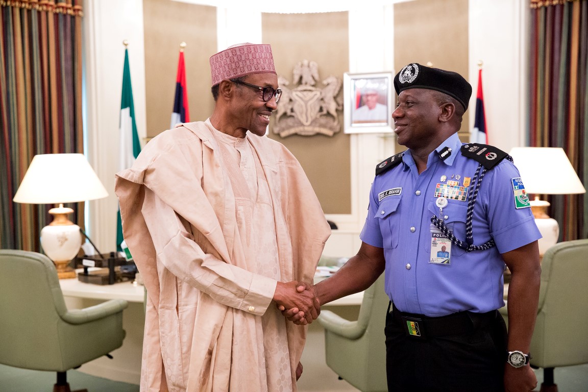 New IG 3 - THEWILL NEWS MEDIA President Buhari with Mr. Idris Tuesday at the Presidential Villa.