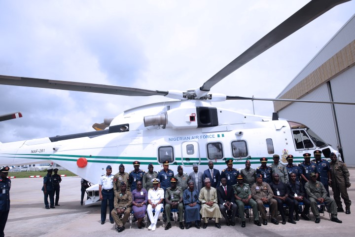 TWO PRESIDETIAL HELICOPTERS DONATED TO AIRFORCE - THEWILL NEWS MEDIA FGN DONATES TWO PRESIDENTIAL HELICOPTERS 2. Minister of Defence, Brig General Mansur Dan-Ali (M) flanked by service Chiefs as two Presidential Helicopters been handed over to the Nigerian Airforce at the Presidential wing of Nnamdi Azikwe International Airport in Abuja. PHOTO; SUNDAY AGHAEZE. OCT 10 2016.