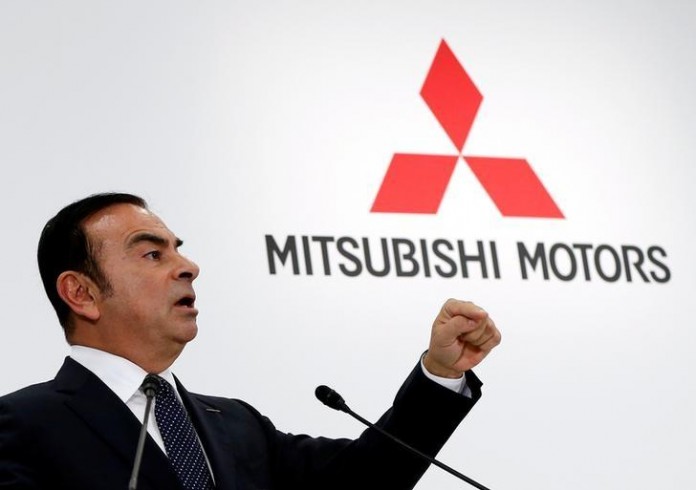 Ghosn, Chairman and CEO of the Renault-Nissan Alliance attends a joint news conference with Mitsubishi Motors Corp's Chairman and CEO Masuko in Tokyo