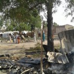 Boko Haram: Four Female Suicide Bombers, Two Others Die In Borno Attacks People walk at the site after a bombing attack of an internally displaced persons camp in Rann, Nigeria January 17, 2017. MSF/Handout via Reuters