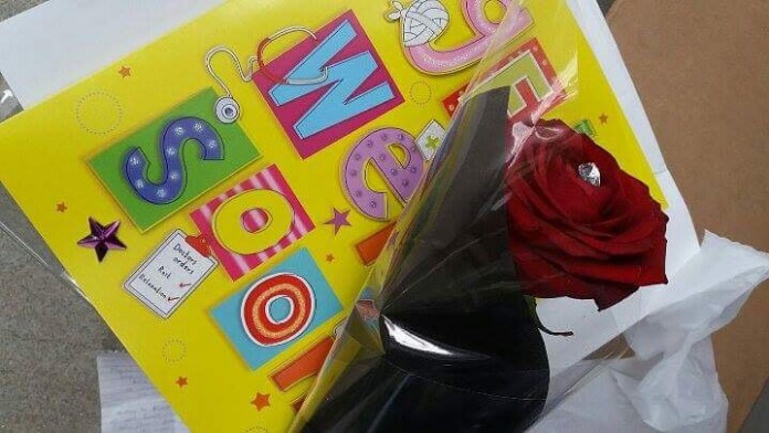Card and flower for Buhari