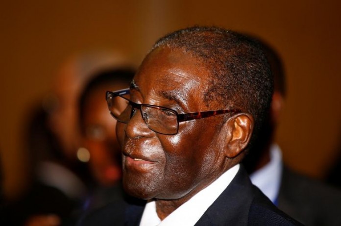 Zimbabwe's President Robert Mugabe arrives for the 28th Ordinary Session of the Assembly of the Heads of State and the Government of the African Union in Ethiopia's capital Addis Ababa