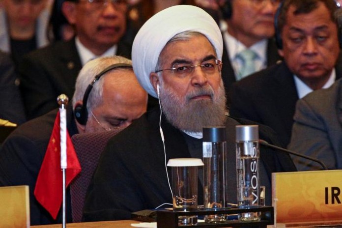 FILE PHOTO: Iran's President Hassan Rouhani attends a meeting during the Asia Cooperation Dialogue summit at the Foreign Ministry in Bangkok