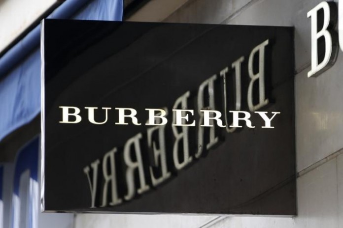 The logo of Burberry outlet store is seen in Paris
