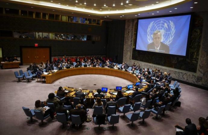 U.N. Ebola mission chief Anthony Banbury (on Screen) speaks to members of the United Nations Security Council during a meeting on the Ebola crisis at the U.N. headquarters in New York