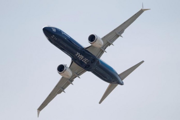 A Boeing 737 Max takes part in flying display at the 52nd Paris Air Show at Le Bourget Airport near Paris