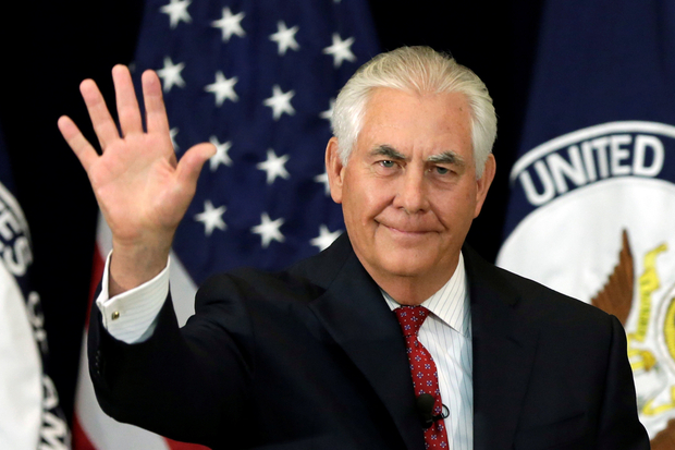 U.S. Secretary of State Rex Tillerson waves after delivering remarks in Washington