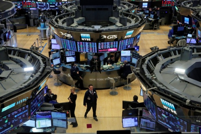 FILE PHOTO: The trading floor is seen on the final day of trading for the year at the New York Stock Exchange (NYSE) in Manhattan, New York