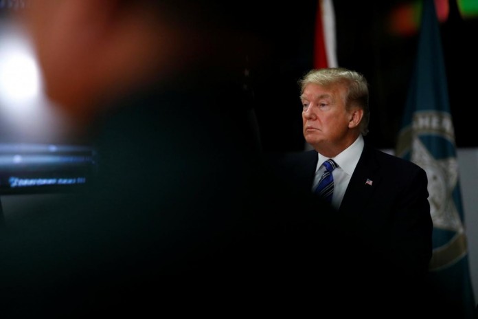 U.S. President Donald Trump meets with law enforcement at the Broward County Sheriff's Office in the wake of the shooting at Marjory Stoneman Douglas High School in Fort Lauderdale