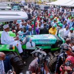 Buhari Drives Tractor In Plateau, Launches Ownership Scheme