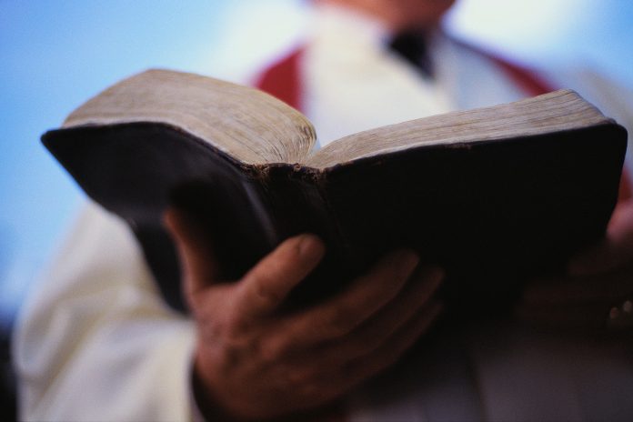 bible-and-priest