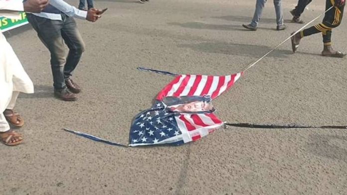 Shiites Protest In Abuja, Burn US Flag