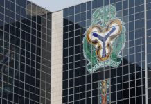 THEWILL EDITORIAL: Curbing Expanding e-Payment Frauds Central Bank of Nigeria's logo is seen on the headquarters building in Abuja, Nigeria January 22, 2018. REUTERS/Afolabi Sotunde - RC1D90C799D0