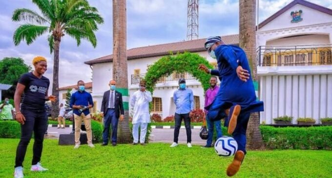 Sanwo-Olu Displays Football Skills As Barcelona Star Oshoala Visits
