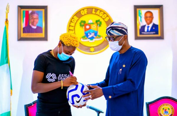 Sanwo-Olu Displays Football Skills As Barcelona Star Oshoala Visits