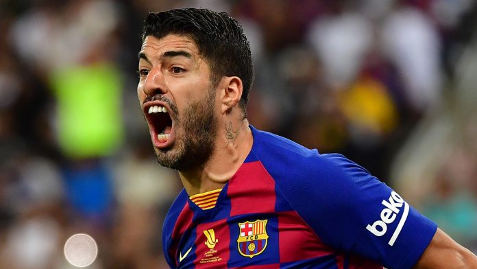 Barcelona's Uruguayan forward Luis Suarez reacts during the Spanish Super Cup semi final between Barcelona and Atletico Madrid on January 9, 2020, at the King Abdullah Sport City in the Saudi Arabian port city of Jeddah. - The winner will face Real Madrid in the final on January 12. (Photo by Giuseppe CACACE / AFP) (Photo by GIUSEPPE CACACE/AFP via Getty Images)