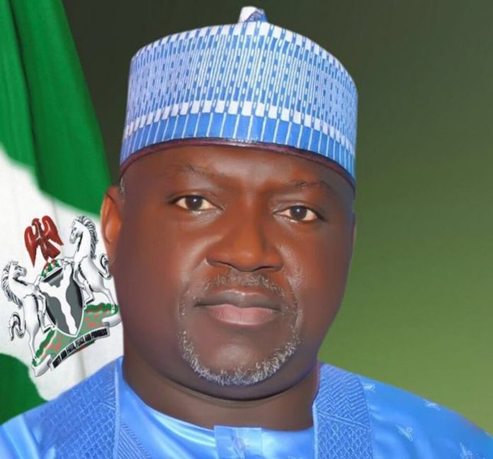 Ojo Amos Olatunde as Clerk to the National Assembly.