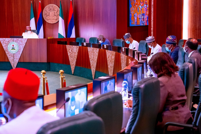 President Muhammadu Buhari receives briefing from members of the Presidential Economic Advisory Council (PEAC) earlier at the State House, Abuja.