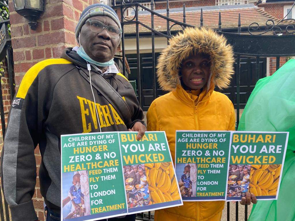 Ex_Pu2qXAAcdyHI - THEWILL NEWS MEDIA Nigerians in UK today stormed Abuja House in London, protesting and demanding Buhari must return back to Nigeria
