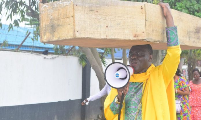 Pastor-With-Coffin Pastor With Coffin