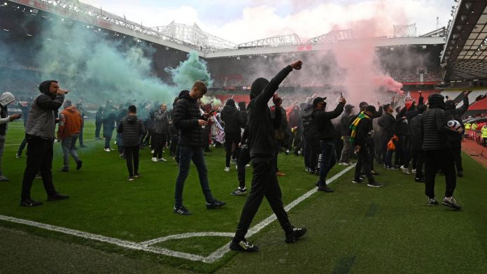Protesting Man U Fans Invade Old Trafford Protesting Man U Fans Invade Old Trafford