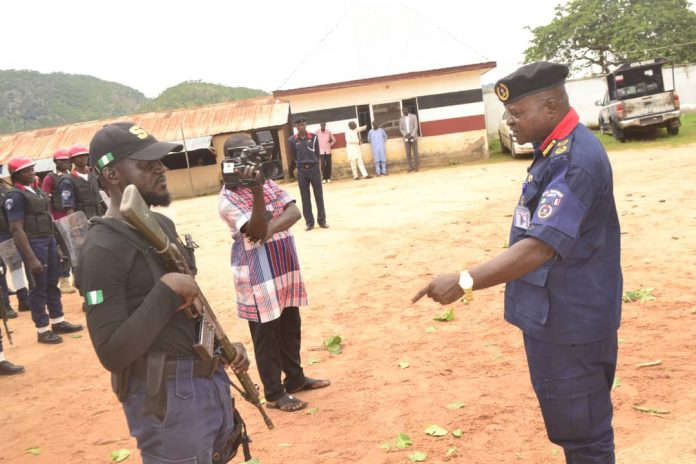 Civil Defence personnel displaying their skills during the inaugural ceremony of NSCDC’s Quick Combatant Response Team at the Command Headquarters in Jalingo, Taraba State... on Monday