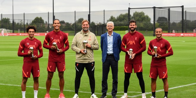 Arsene Wenger Storms Liverpool To Present Coach And Players Their FIFA Awards