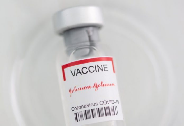 FILE PHOTO: Vial labelled "Johnson&Johnson coronavirus disease (COVID-19) vaccine" is seen in this illustration picture J&J COVID Vaccine