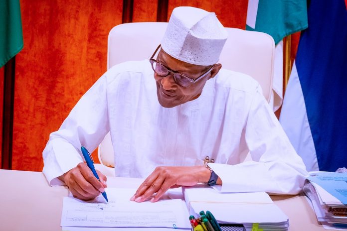 Buhari Signs Petroleum Industry Bill Into Law