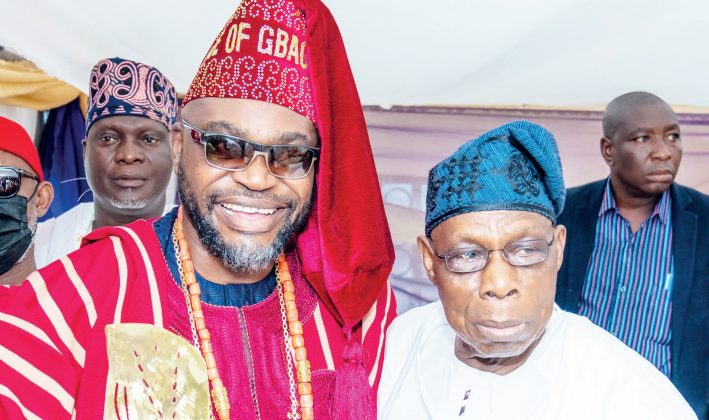 R-L Former President Olusegun Obasanjo & Aare Babalaje of Gbaguraland, Chief Francis Momoh.
