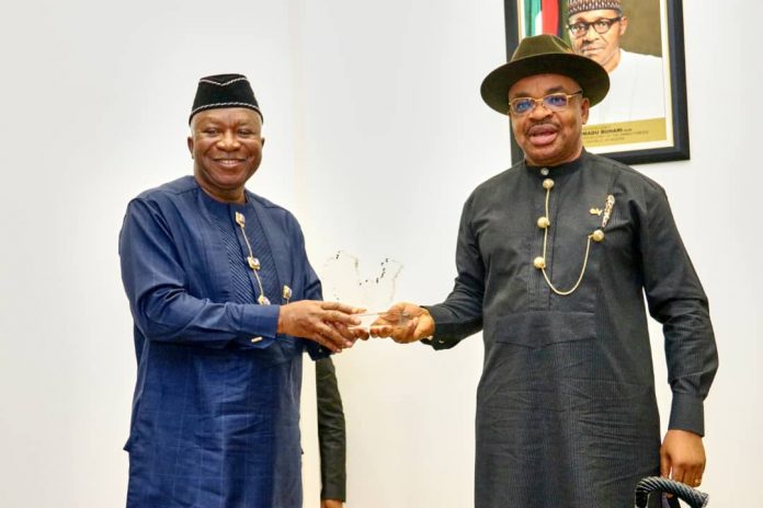 Col. Milland Dixon Dikio (rtd) & Akwa Ibom State’s Governor Udom Emmanuel Col. Milland Dixon Dikio (rtd) & Akwa Ibom State’s Governor Udom Emmanuel