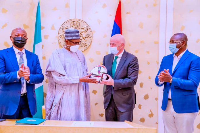 Buhari and FIFA, CAF rep