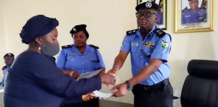 Police presenting cheques