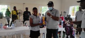 Female champion, Mustapha Boluwatife, with her trophy