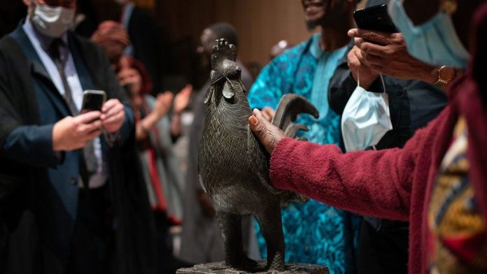 Stolen Benin bronze cockerel