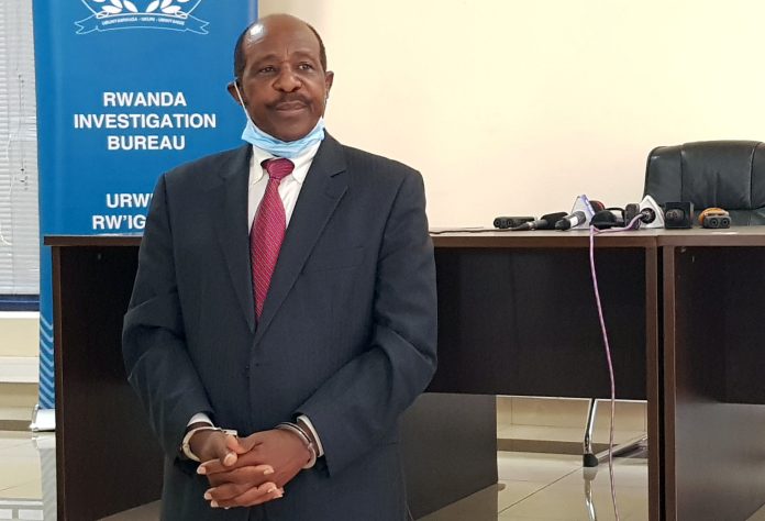 Rusesabagina is detained and paraded in front of media in handcuffs in Kigali Paul Rusesabagina