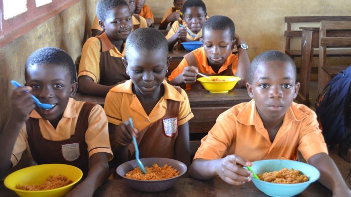 children in school eating