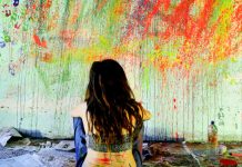 My Nigeria: Five Writers and Artists Reflect on The Place They Call Home Rear View Of Woman Sitting On Floor Against Messy Wall