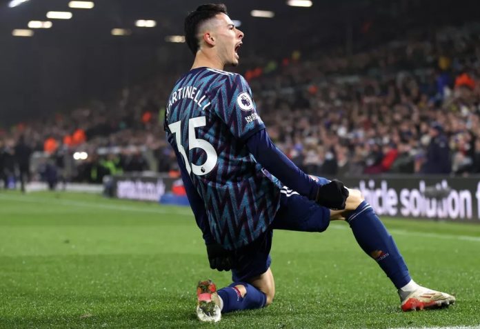 Gabriel Martinelli of Arsenal celebrates after scoring their team's first goal during the Premier League match