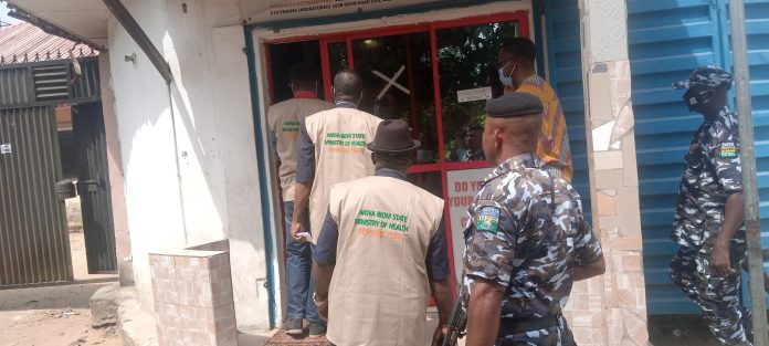 Officials of Akwa Ibom State Ministry of Health and security operatives during the operation.